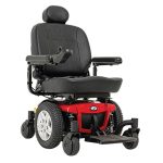 Jazzy mid-wheel power wheelchair in red with captain’s seat and footplate