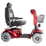 Merits Pioneer 10 heavy-duty mobility scooter in red with 22-inch high-back captain’s seat and front basket